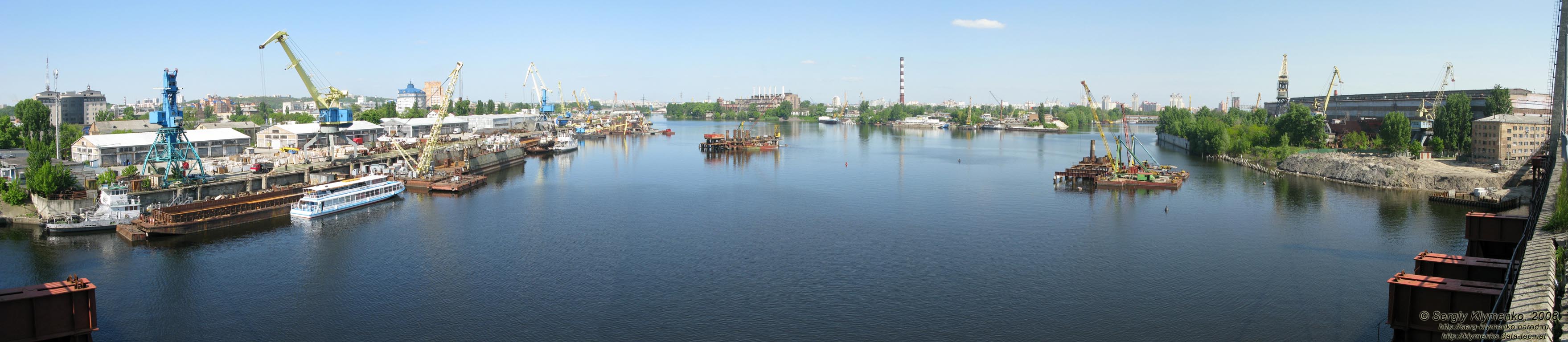 Фото Киева. Панорама (~180°) Киевской гавани со старого Рыбальского вантового моста. Строится новый мост над гаванью...