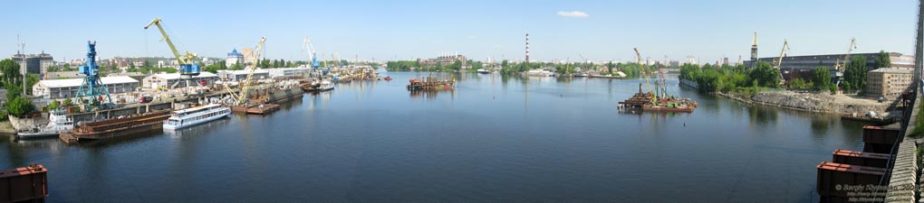Фото Киева. Панорама (~180°) Киевской гавани со старого Рыбальского вантового моста. Строится новый мост над гаванью...